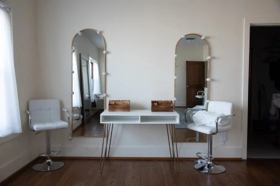 Bridal suite with arched vanity mirrors